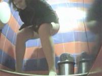 Two hotties gets spycammed while pissing
