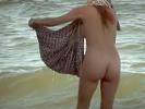 Sexy body of a naked beach babe in hot voyeur movies