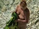 Absolutely nude sunbathing chick gets furtively filmed