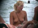 Blonde nudist caught on cam while leaving the sea