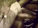 A guy is working at his desk when a girl comes in with a bottle of champagne. A little later the both of them are naked and he is fucking her from behind while she is massaging her pussy until he comes on her stomach.