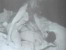A naked guy is laying on a bed. Next to it a naked girl is showing off her body to him. A little later she is on top of him, his dick buried in her pussy and riding him wildly. Then she gives him a blow job.