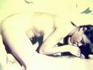 In this vintage movie a girl lies on top of a guy in 69 position. She sucks his dick while he is licking her pussy. A little later she lies down on the bedroom floor and spreads her legs so he can fuck her.