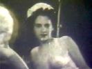 In this vintage black and white movie two young girls are on a bed. They undress each other and then lick each others hairy pussies in turn.