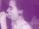 In this old black and white movie a very skinny girl is next to a half naked man on a bed. She takes off her bra and panties and begins to fondle his dick, trying to make it bigger with her fingers and lips. He fucks her in the mouth and comes on her pussy.
