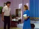 A female doctor goes into her bedroom and catches a guy who is sneaking around in there. She demands to see his cock and the both of them end up on the bed, fucking each other.