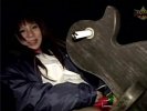 An Asian teenager is on a rocking horse. She spreads her legs and shows a vibrating egg that she is wearing in her panties. A little later she has taken her pants off and holds the vibrator against her hairy pussy.