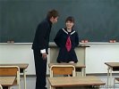 An Asian girl in a schoolgirls uniform is sitting in a classroom when a guy comes in. She seduces him, masturbating on top of the teachers desk. Then he finger fucks her for a while before the both of them undress and screw each other on the classroom floor.