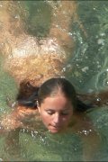 Naked beach girl caught having fun with a horny guy