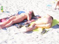 Nudist beach shows off two gorgeous naked teens