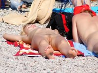 Look at this slim Russian nudist getting a tan